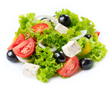 Fresh salad with lettuce, tomatoes, and onion